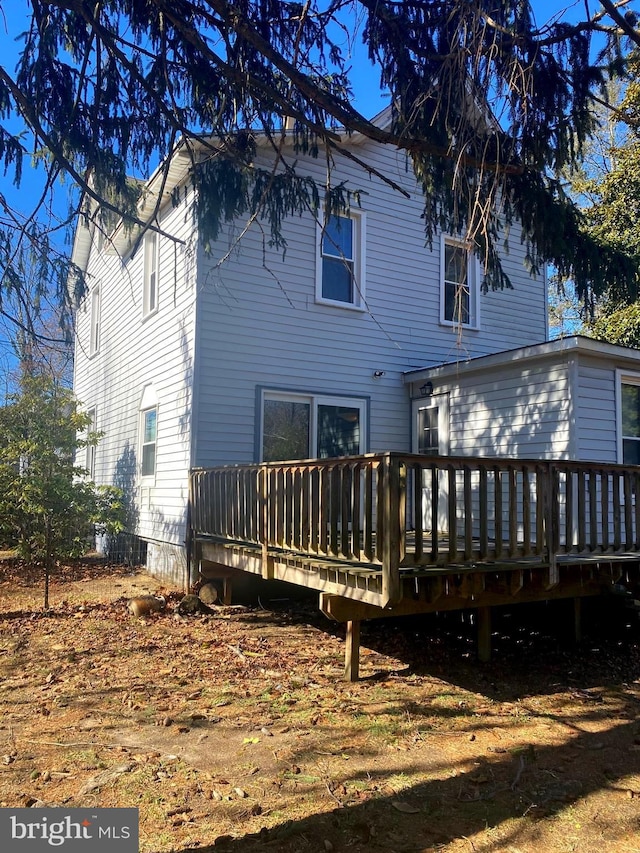 rear view of house with a deck