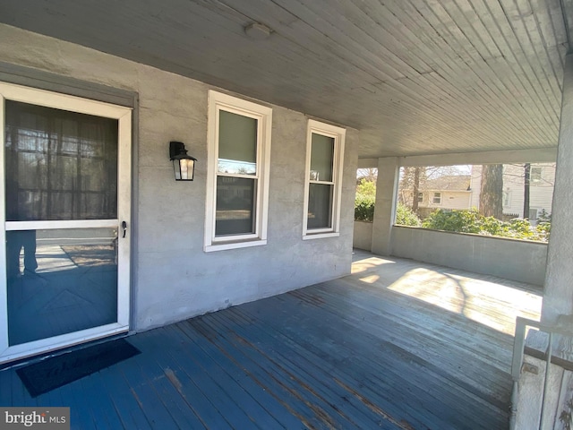 wooden deck featuring a porch