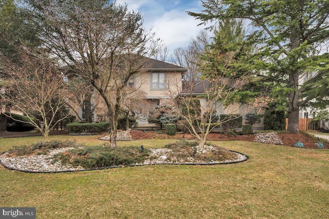 exterior space featuring a front lawn