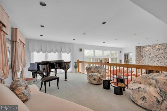 living room with recessed lighting and light colored carpet