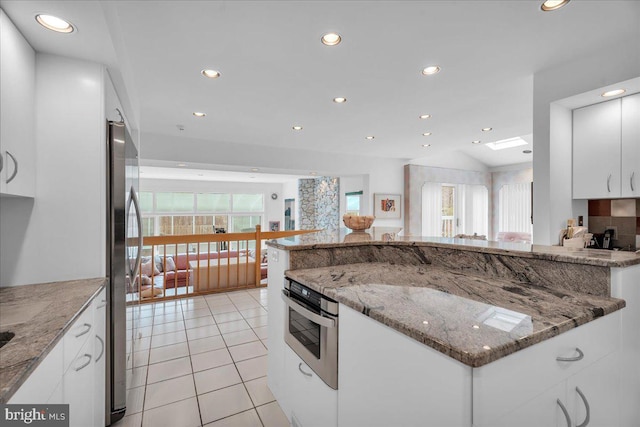 kitchen with white cabinetry, light tile patterned floors, recessed lighting, and appliances with stainless steel finishes