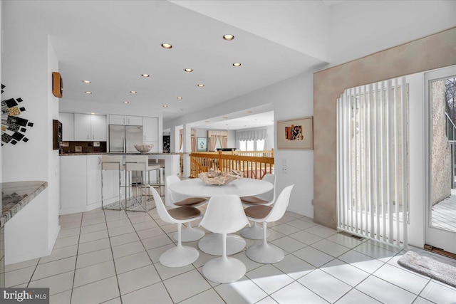 dining area featuring light tile patterned floors, recessed lighting, and visible vents