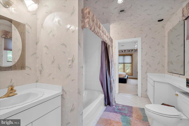 full bath with vanity, visible vents, wallpapered walls, tile patterned floors, and toilet