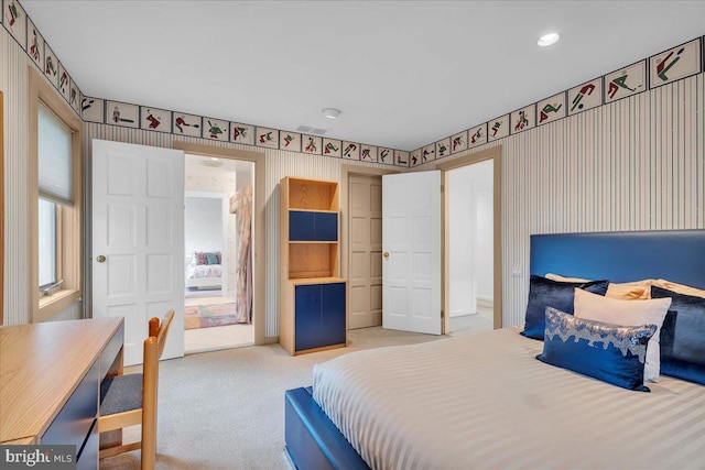 carpeted bedroom featuring visible vents and recessed lighting