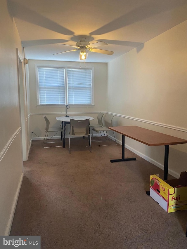 recreation room featuring carpet, baseboards, and ceiling fan