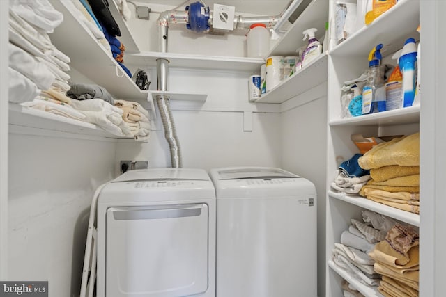 laundry room featuring laundry area and separate washer and dryer