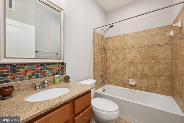 full bathroom featuring toilet, shower / bathtub combination, vanity, and decorative backsplash