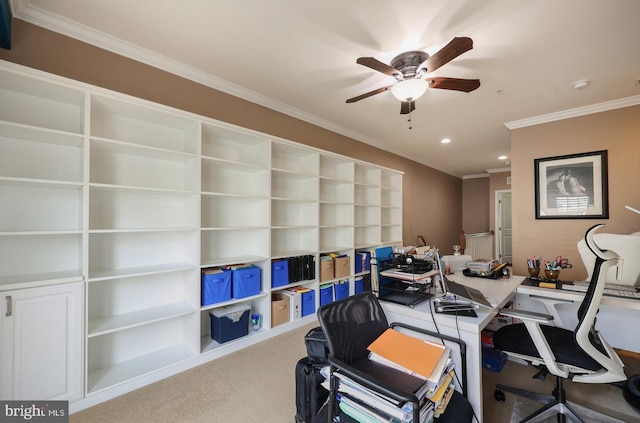 carpeted home office with ornamental molding, recessed lighting, ceiling fan, and built in features