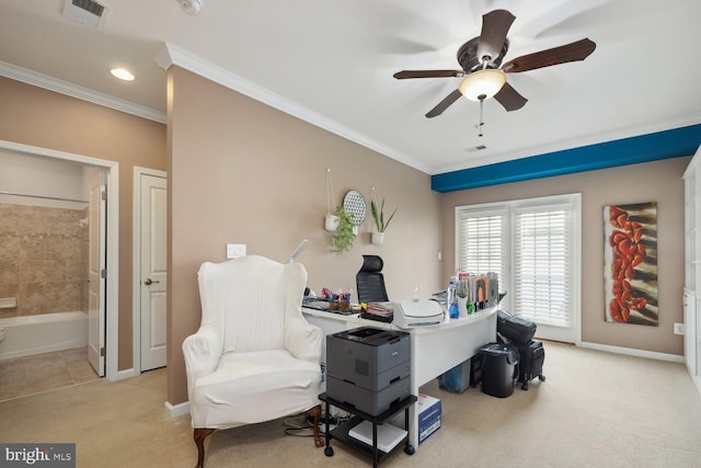 home office with crown molding, visible vents, ceiling fan, and light carpet
