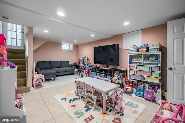 playroom with tile patterned floors and recessed lighting