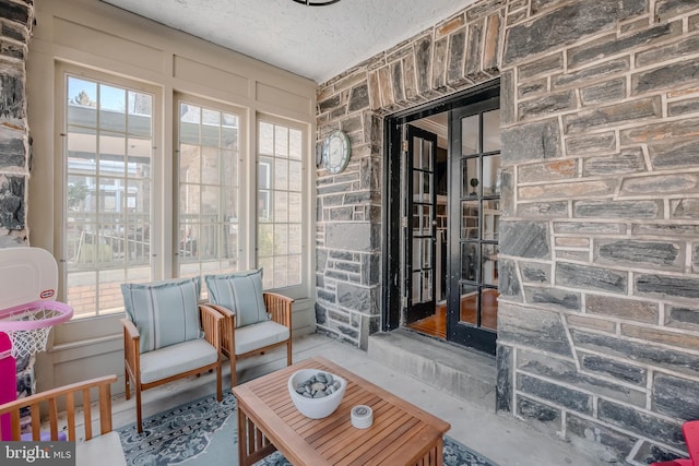 sunroom / solarium with a wealth of natural light