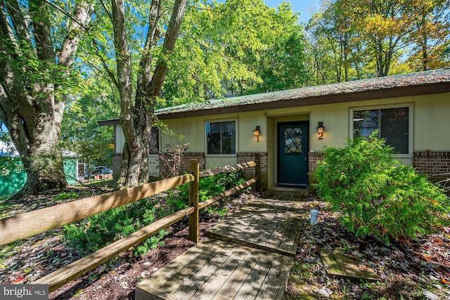 view of front of property featuring brick siding