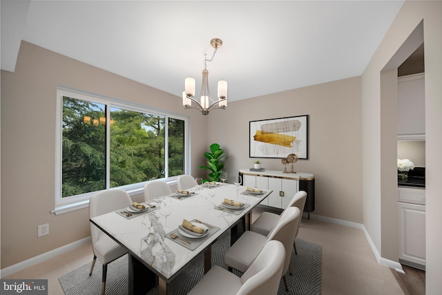11305 Commonwealth Dr Unit 302, Rockville, MD 20852 - dining space with a chandelier, light carpet, and baseboards