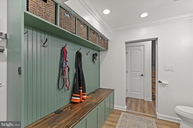 mudroom with recessed lighting, light wood-style flooring, baseboards, and ornamental molding