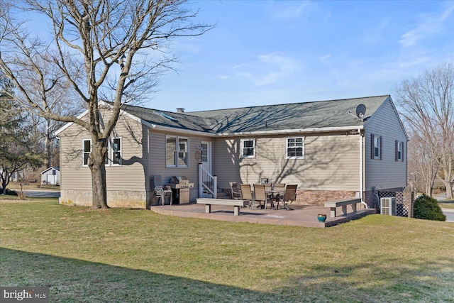 back of house with a yard, entry steps, and a patio area