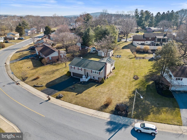 drone / aerial view with a residential view