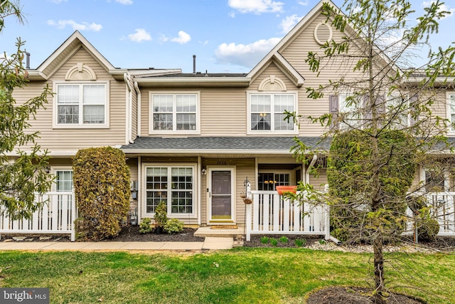 view of property with a front lawn