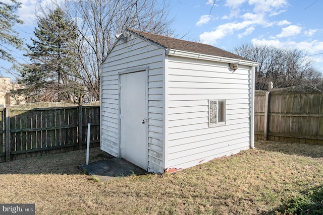 view of shed featuring a fenced backyard