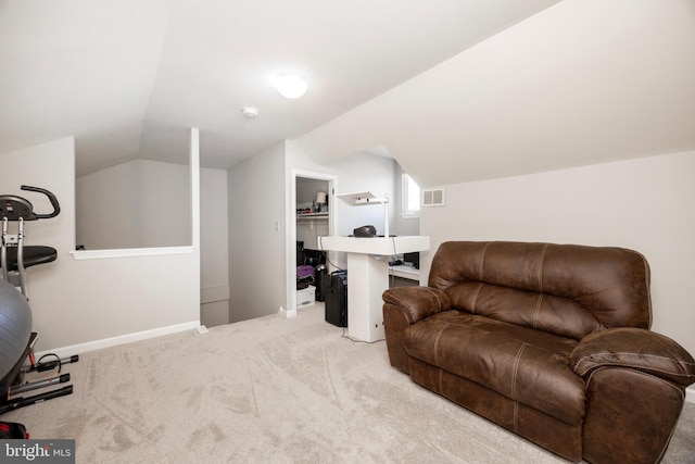 living area with visible vents, lofted ceiling, baseboards, and carpet flooring