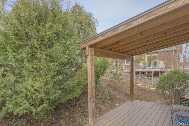 wooden deck featuring fence