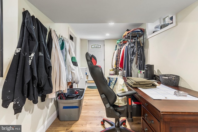 office space with recessed lighting and light wood-type flooring