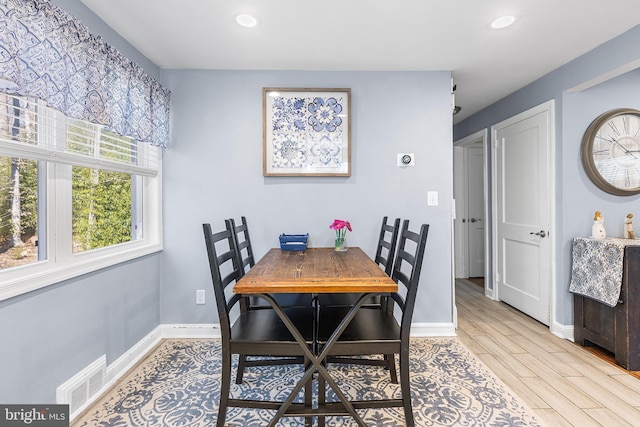 dining area with recessed lighting, visible vents, baseboards, and wood finished floors