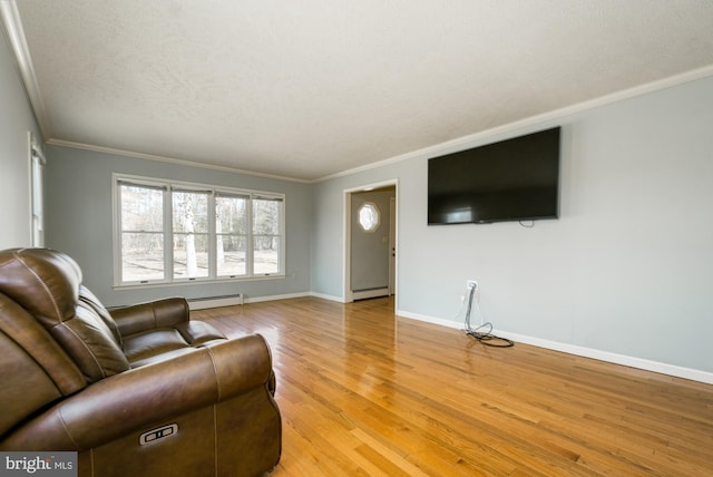 living room featuring light wood-type flooring, a baseboard radiator, baseboards, and ornamental molding