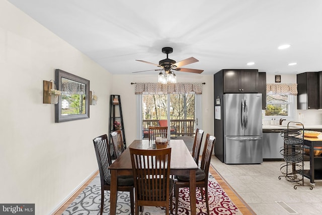 dining area featuring visible vents, recessed lighting, light tile patterned flooring, baseboards, and ceiling fan