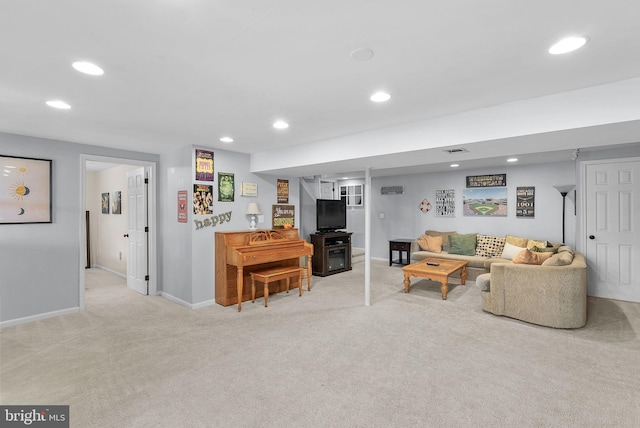 living room with light carpet, recessed lighting, and baseboards