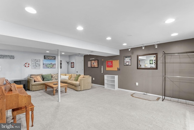 living area with track lighting, recessed lighting, baseboards, and carpet floors