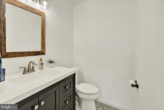 5 Westpointe Dr, Ephrata, PA 17522 - bathroom featuring toilet, vanity, and baseboards