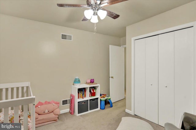 5 Westpointe Dr, Ephrata, PA 17522 - carpeted bedroom with a closet, baseboards, a crib, and ceiling fan