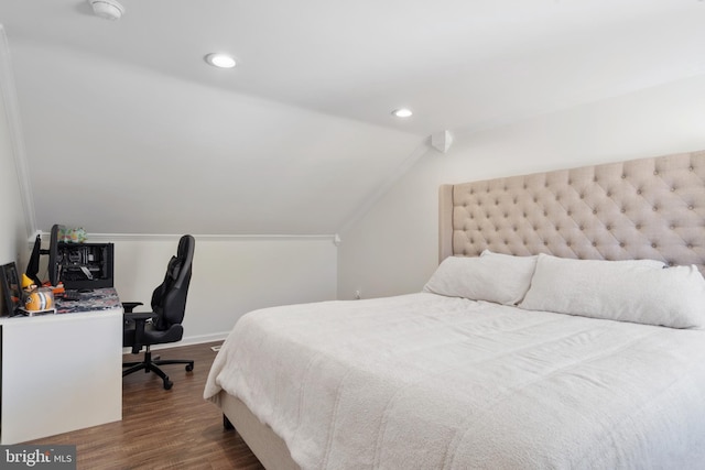 bedroom featuring recessed lighting, baseboards, dark wood-type flooring, and vaulted ceiling