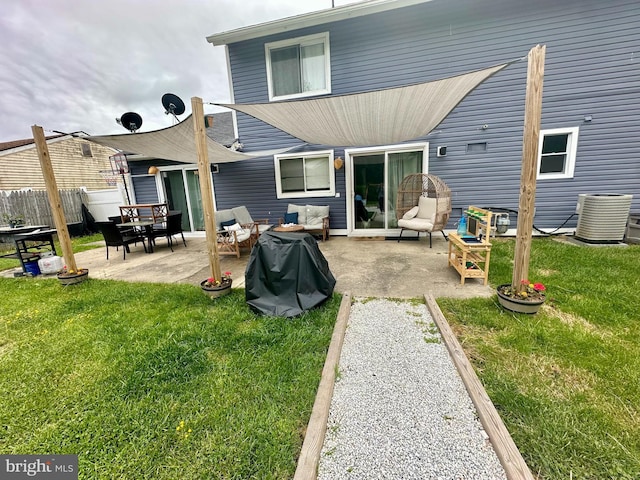 rear view of house featuring a patio, a yard, fence, and central AC