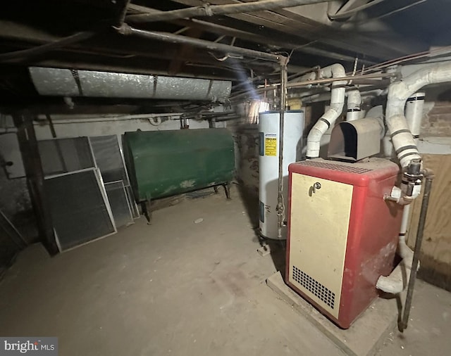 utility room with heating fuel and water heater