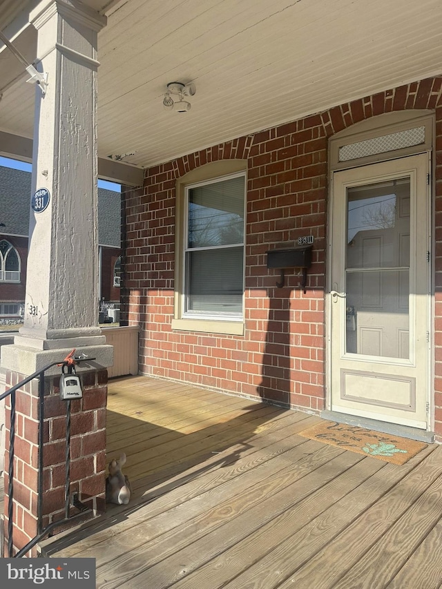 wooden deck with a porch