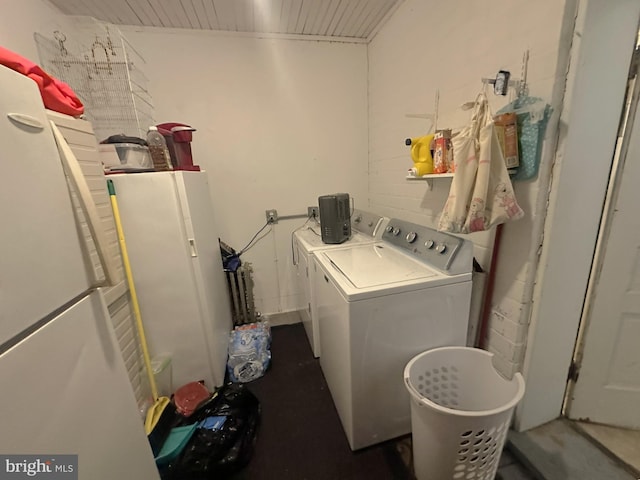 laundry room featuring laundry area and separate washer and dryer