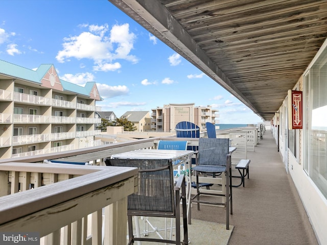 view of patio / terrace with a balcony