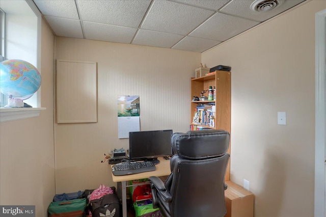 office with visible vents and a paneled ceiling