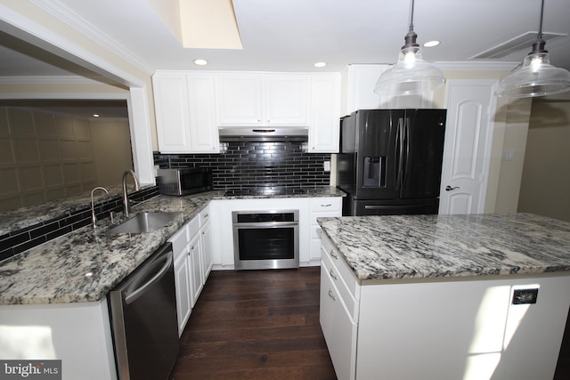 kitchen featuring a sink, black appliances, dark wood-type flooring, under cabinet range hood, and crown molding