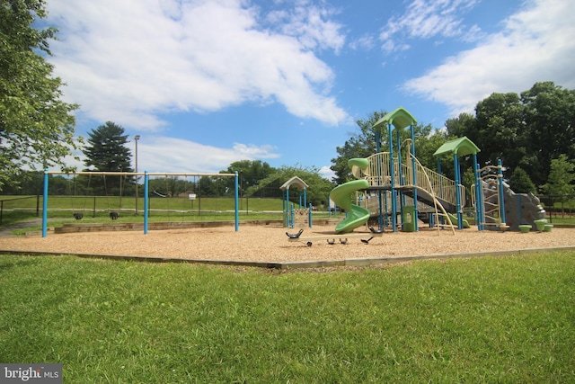 communal playground with a lawn