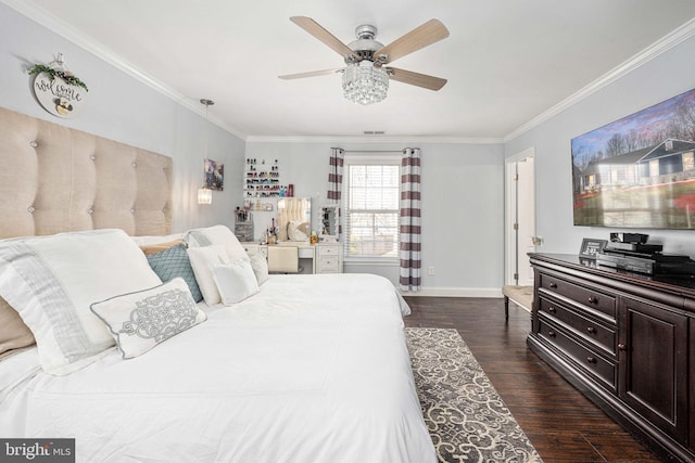 bedroom featuring a ceiling fan, baseboards, visible vents, dark wood-type flooring, and crown molding