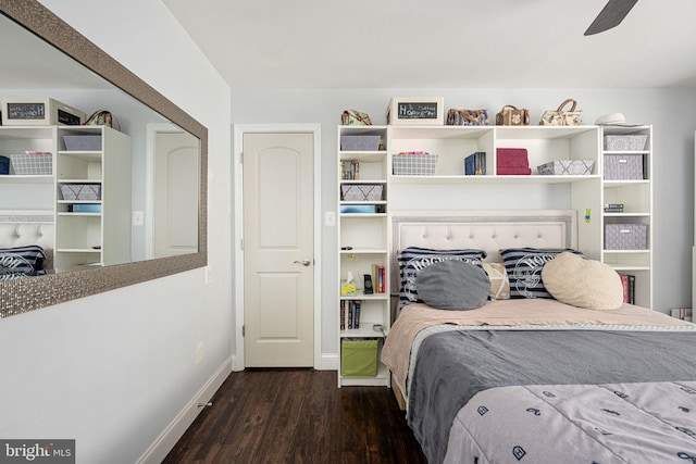 bedroom with wood finished floors, baseboards, and ceiling fan