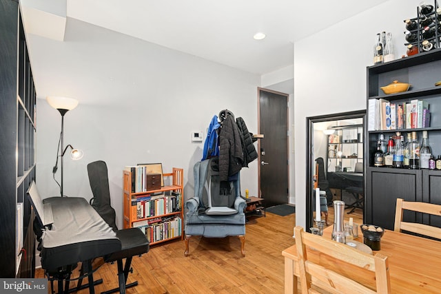 living area featuring recessed lighting and wood finished floors