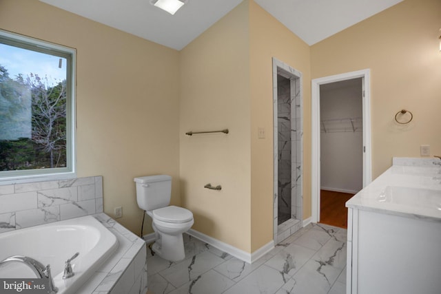 full bath with baseboards, a shower stall, a walk in closet, a garden tub, and marble finish floor