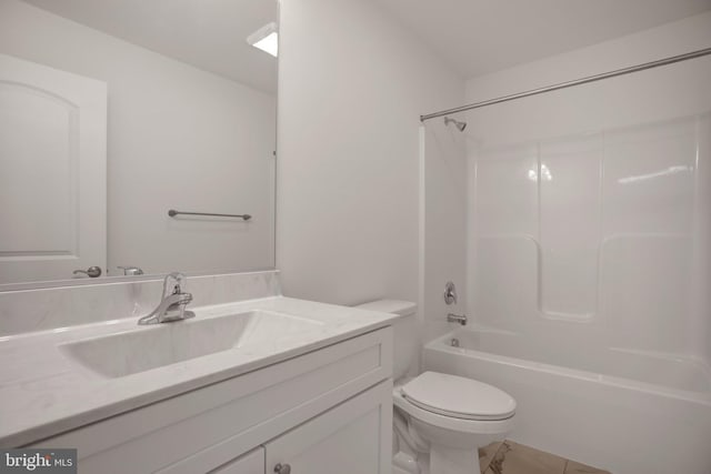 full bathroom featuring vanity, toilet, and bathtub / shower combination