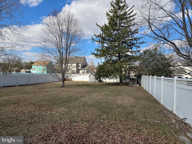 view of yard featuring a fenced backyard