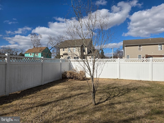 view of yard featuring a fenced backyard