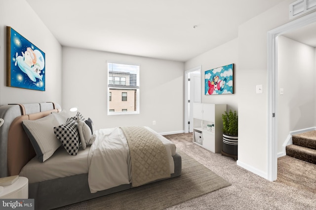 bedroom with visible vents, baseboards, and carpet flooring