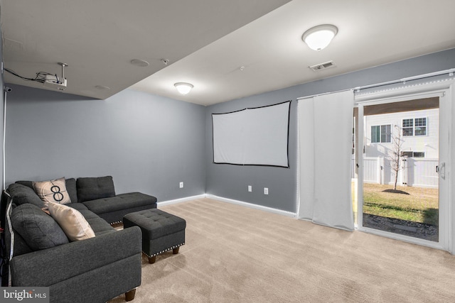 home theater with visible vents, carpet floors, and baseboards